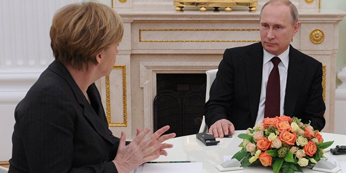 Путин и Меркель обсудили прекращение огня в Донбассе